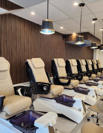 a room with chairs and lights