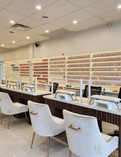 a room with white chairs and a white counter